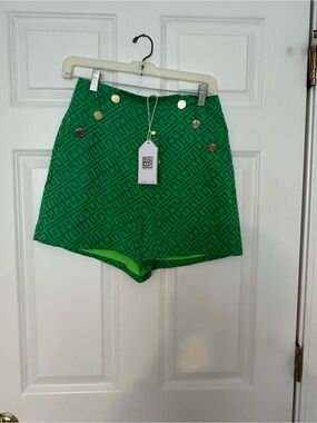 Emily McCarthy green shorts